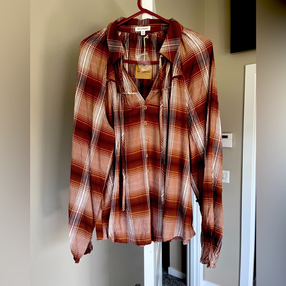 Size Medium, woman’s blouse